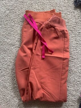 Figs Women's Track Pants in Rust with Pink Drawstring